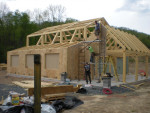 SIPs going on to the timber frame shell.