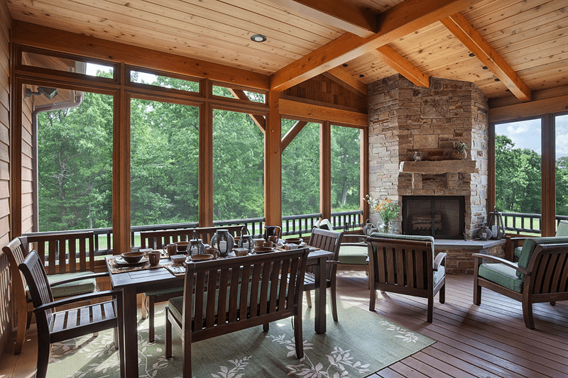 Patio Timber Frame With a Fireplace by Woodhouse, The Timber Frame Company