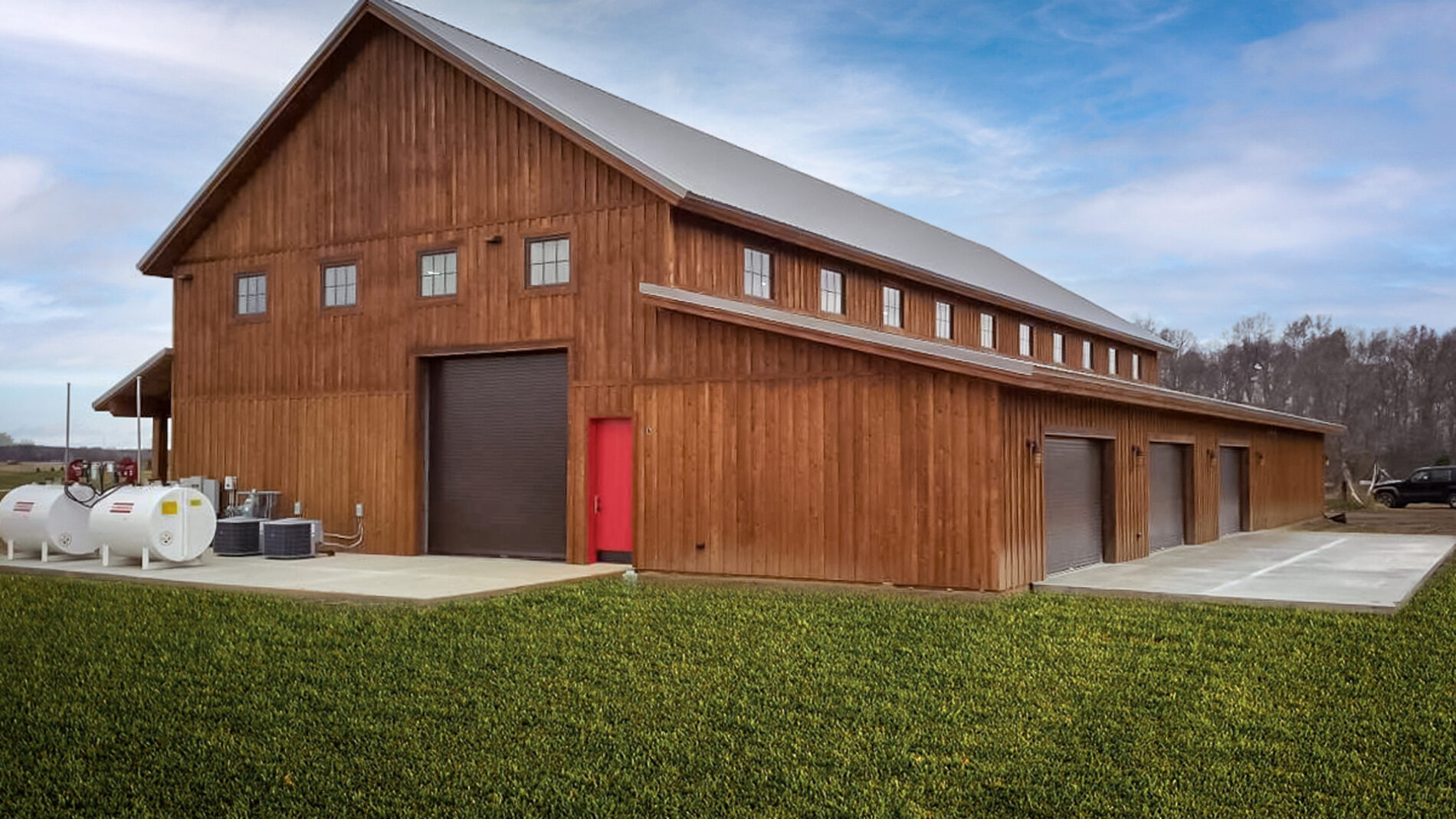 Timber Frame Car Barns - Woodhouse The Timber Frame Company