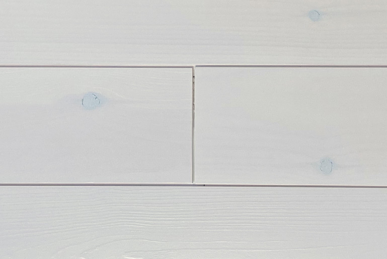 Tongue and Groove wood panels with the Whitewash finish.