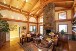 A timberframe great room with a large fireplace